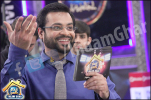 Amir Liaquat Hussain on a popular TV show, engaging with the audiance.